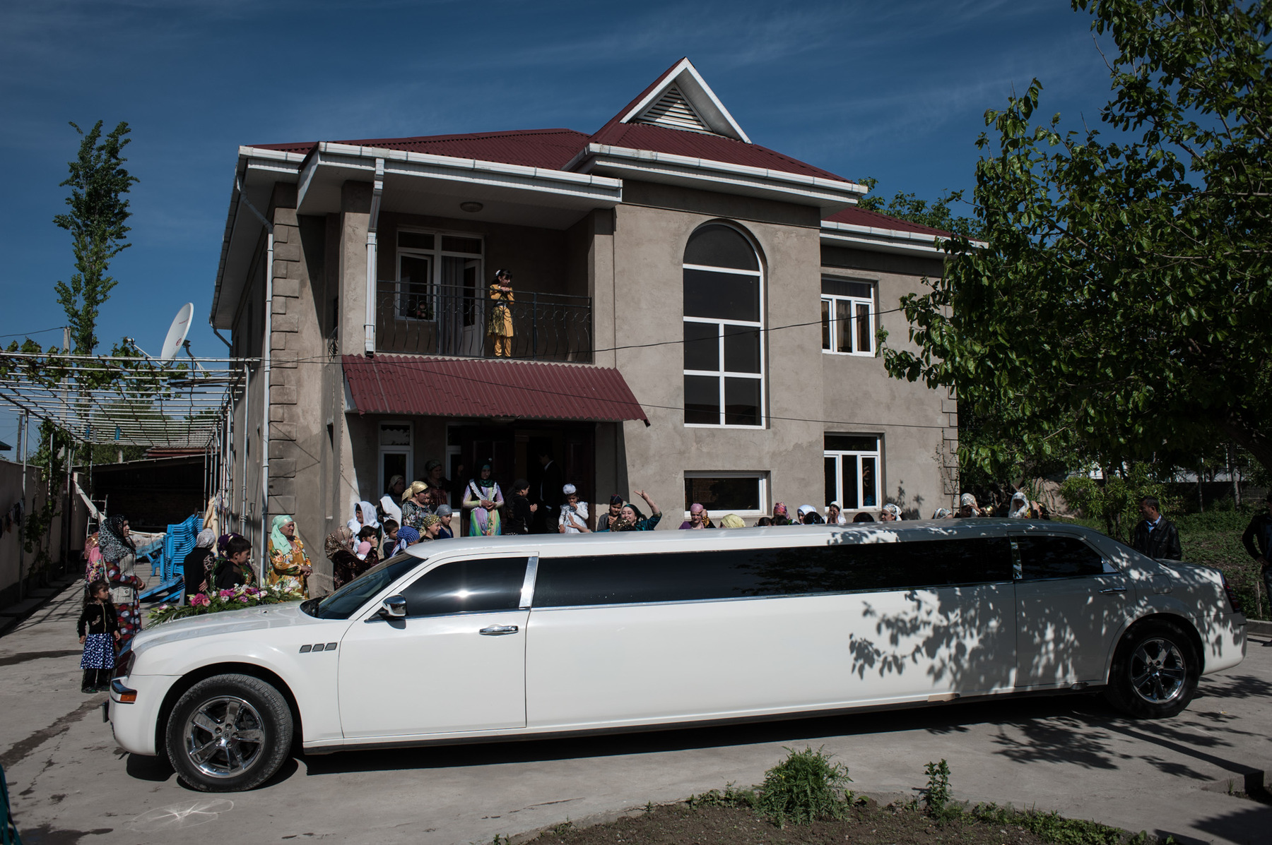 Konstantin Salomatin - 19 Limo chirsler is waiting for Eraj Mahmadov, the groom, in his yard. Then he gets in , go to pick up the bride at her home, then to wedding office. Tajikistan, Dushanbe outskirts, Sharora township.